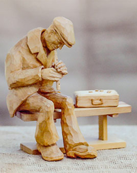 Flute Player wood sculpture